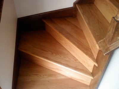 Rebuilt and refinished red oak winder stairs