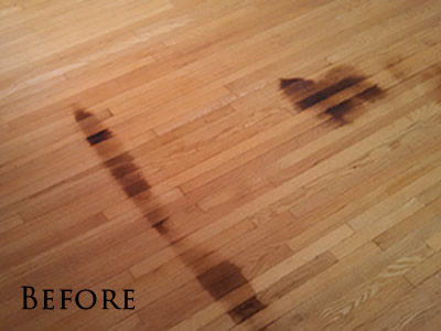 Urine stained red oak floor